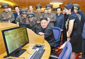 金正恩攜夫人視察朝鮮餐廳 吃爆米花稱真香 金正恩攜夫人視察朝鮮餐廳 吃爆米花稱真香