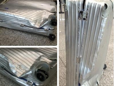 被壓壞的行李箱 被壓壞的行李箱