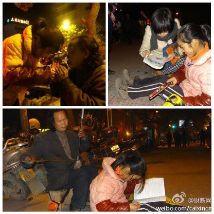 12歲女孩牽盲父賣藝 路燈下寫作業(圖)